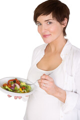 Obraz na płótnie Canvas Portrait of pregnant woman having salad