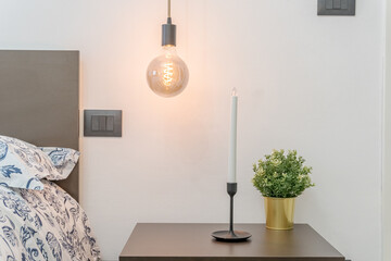 bedroom lamp with chandle and plant