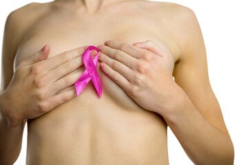 Midsection of naked woman with pink ribbon covering breast 