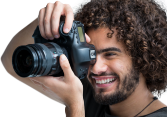 Close up of cheerful male photographer taking picture with camera 
