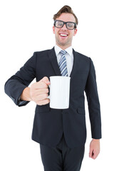Happy geeky businessman holding coffee mug