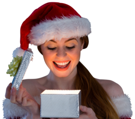 Sexy girl in santa costume opening a gift