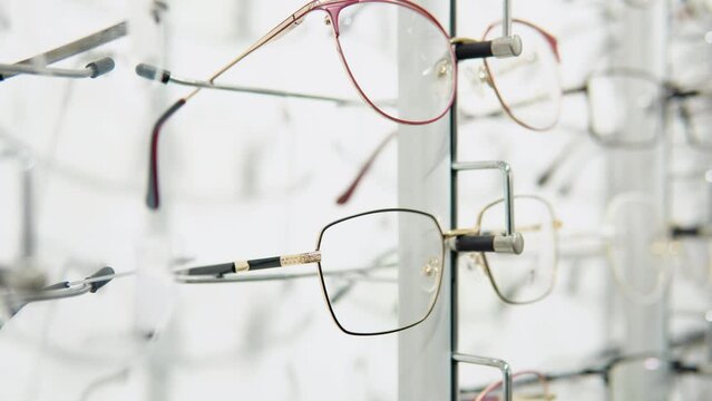 Showcase with glasses in modern optic store