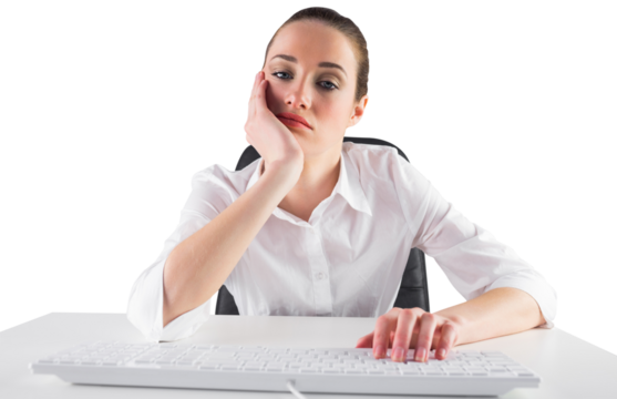 Bored businesswoman typing on keyboard - Powered by Adobe
