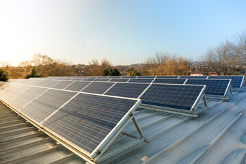 Photovoltaic solar panels on a factory roof.