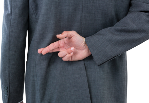 Mid section of businessman standing with fingers crossed - Powered by Adobe