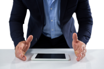 Businessman trying to hold the digital tablet