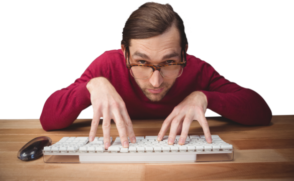 Man wearing eye glasses typing on computer keyboard - Powered by Adobe
