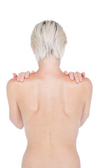 Beautiful topless woman touching her shoulders 