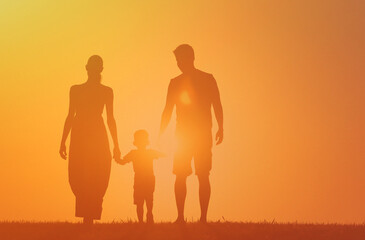 silhouette of family walking in the park