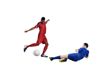 Football players tackling for the ball