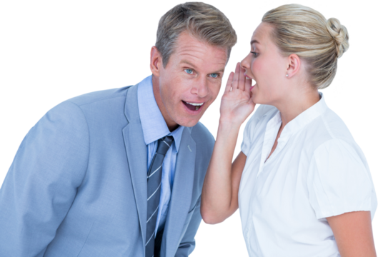 Businessman telling secret to a businesswoman