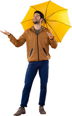 Full length of young man holding yellow umbrella