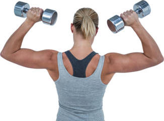 Muscular woman working out with dumbbells