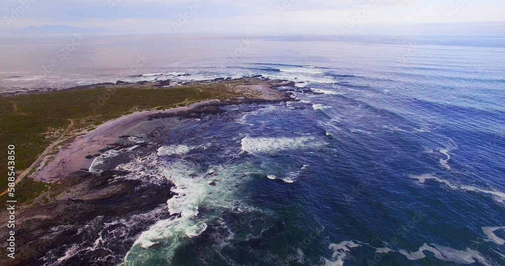 Poster Scenic view of landscape by seascape