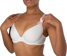 Woman standing for breast cancer awareness with pink ribbon against white background