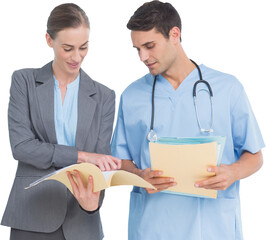 Male and female doctors discussing over reports