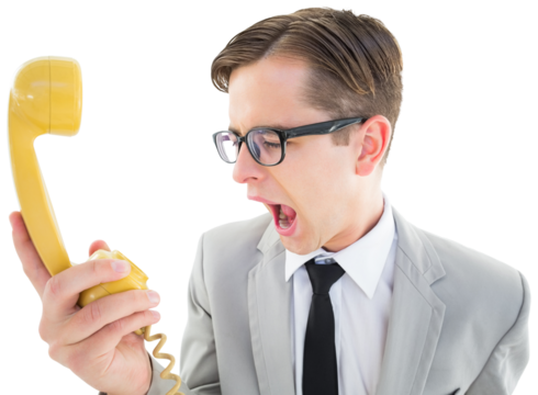 Geeky businessman shouting at retro phone