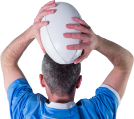Rugby player about to throw a rugby ball