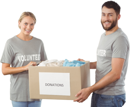 Portrait of smiling volunteer holding clothes donation box 