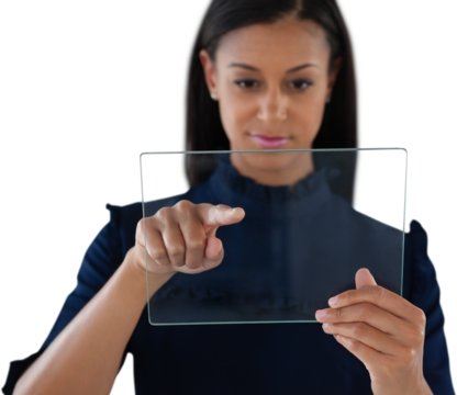Close up of female executive using glass interface