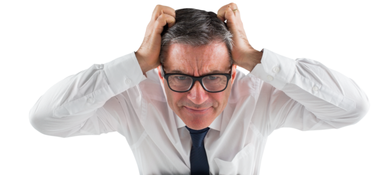 Stressed businessman touching his head - Powered by Adobe