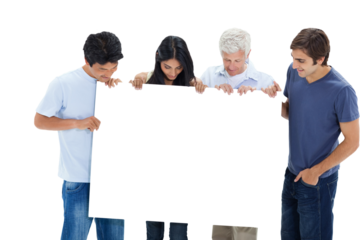 People in jeans holding and watching a big sign 