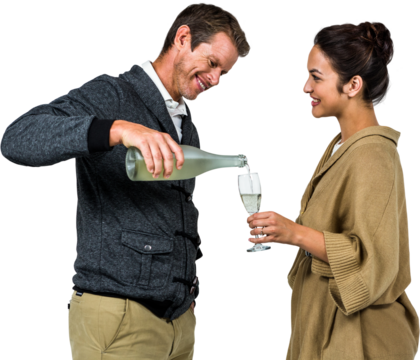 Smiling man pouring wine in glass with woman  - Powered by Adobe