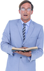 Portrait of surprised businessman holding open book