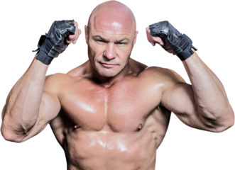 Portrait of bald man showing muscular build