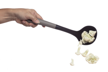 Cauliflower fly fall in turner, green fresh vegetable Cauliflower cut chop slice. Organic fresh vegetable Cauliflower, close up texture. White background isolated freeze motion high speed shutter