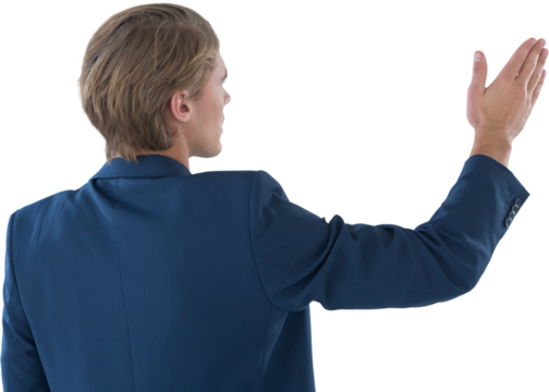 Rear view of businessman gesturing during presentation