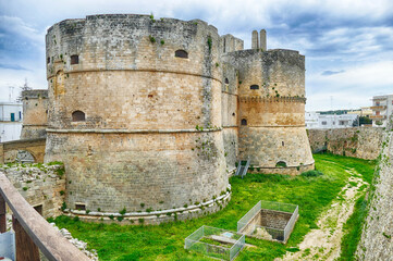 Fototapeta na wymiar Old fortification tower and walls of Otranto