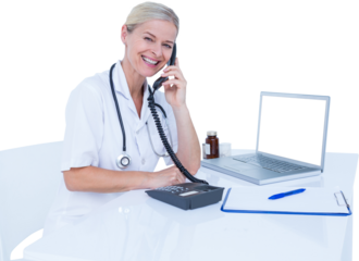 Portrait of smiling businessman using telephone