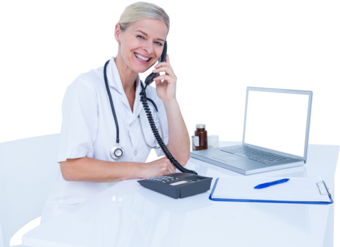 Portrait of smiling businessman using telephone