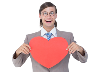 Geeky businessman smiling and holding heart card 