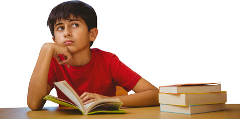 Thoughtful boy reading book in library