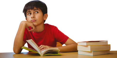 Thoughtful boy reading book in library