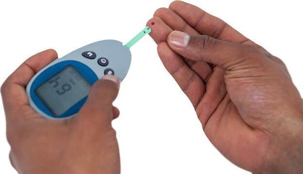 Close up of man hands testing blood sugar with glucometer 