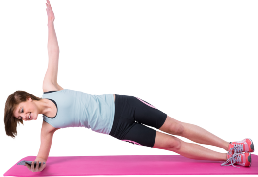 Pretty brunette doing side plank on exercise mat  - Powered by Adobe
