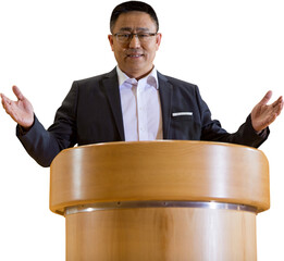 Portrait of businessman giving speech at podium