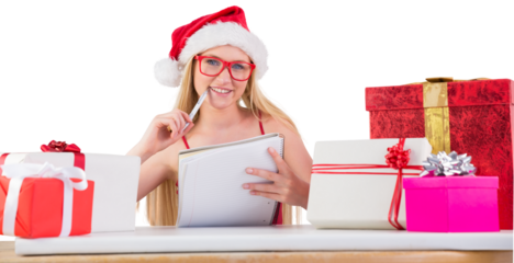 Festive blonde writing her christmas list