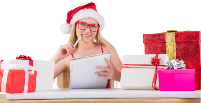 Festive blonde writing her christmas list