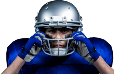 Portrait of American football player wearing helmet