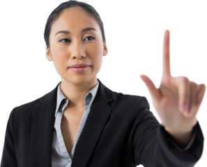 Businesswoman pressing an invisible virtual screen