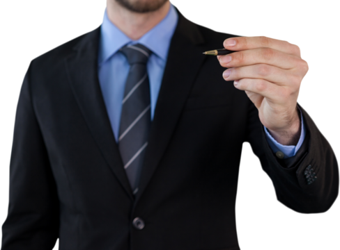 Mid section of businessman writing on invisible interface