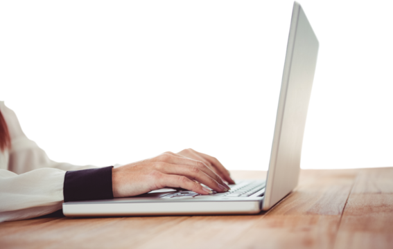 Hipster businesswoman using her laptop