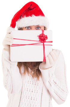 Festive blonde holding a gift