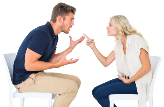 Young couple sitting in chairs arguing