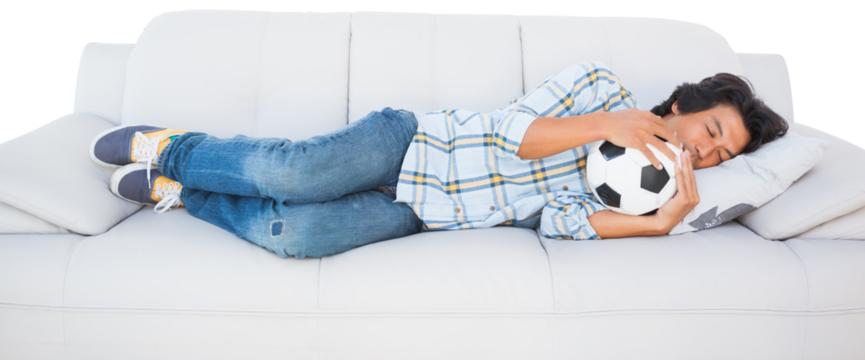 Football fan holding football and sleeping - Powered by Adobe